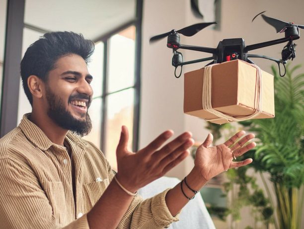 Firefly man confirms the delivery of the parcel from the drone at his home, and is smiling and sayin Firefly man confirms the delivery of the parcel from the drone at his home, and is smiling and sayin